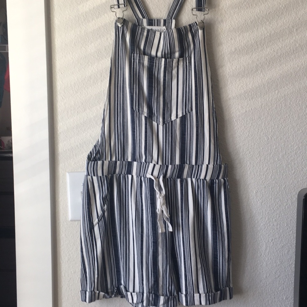 Short overalls. Never been worn.